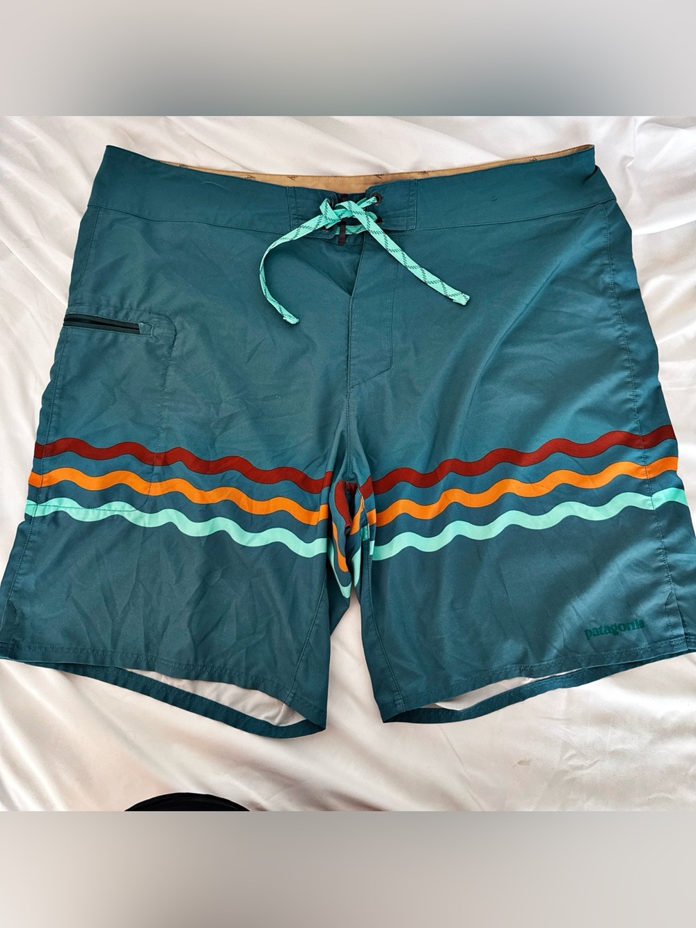 Patagonia Teal Boardshorts with Multicolor Wave Stripes